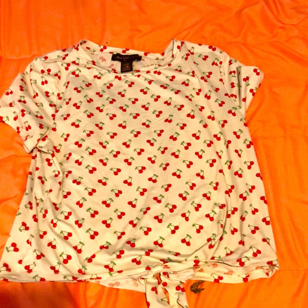 I’m selling a cherry shirt and it’s very cute and u can where it when it’s hot